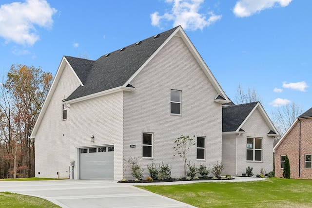 view of property exterior featuring a garage and a yard