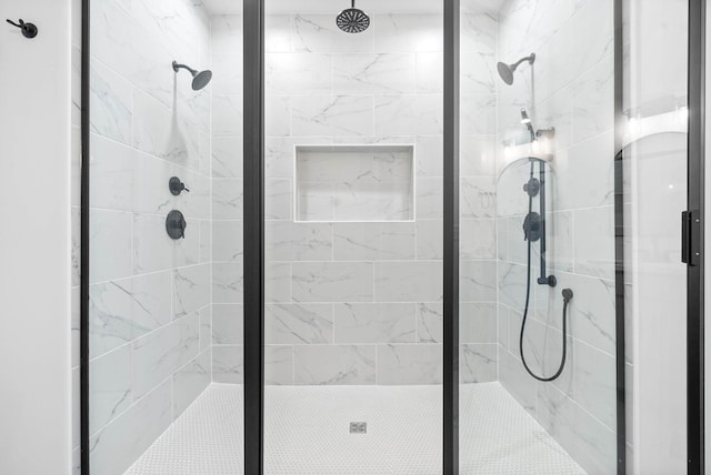 bathroom featuring an enclosed shower