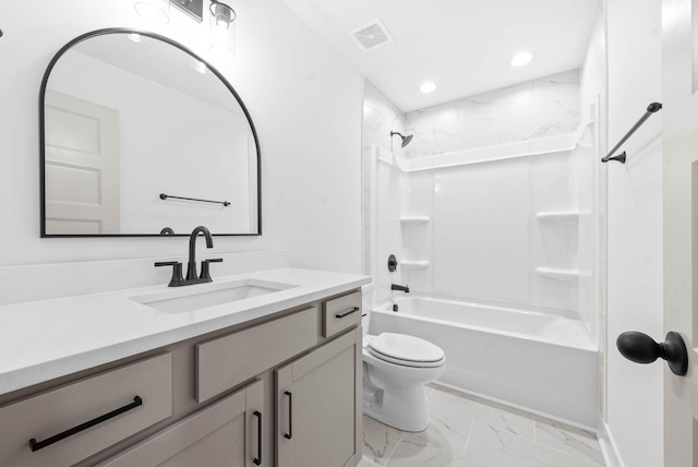 full bathroom featuring vanity, toilet, and  shower combination