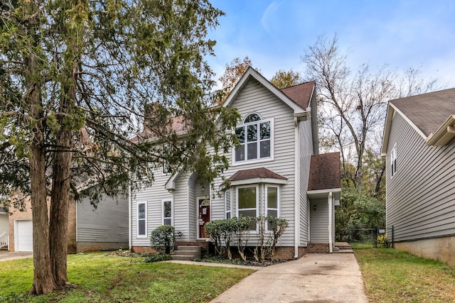 front facade featuring a front yard