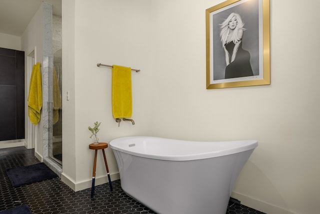 bathroom featuring tile patterned floors and plus walk in shower