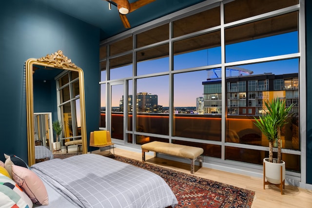 bedroom with wood-type flooring