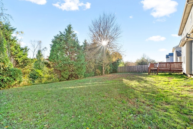 view of yard featuring a deck