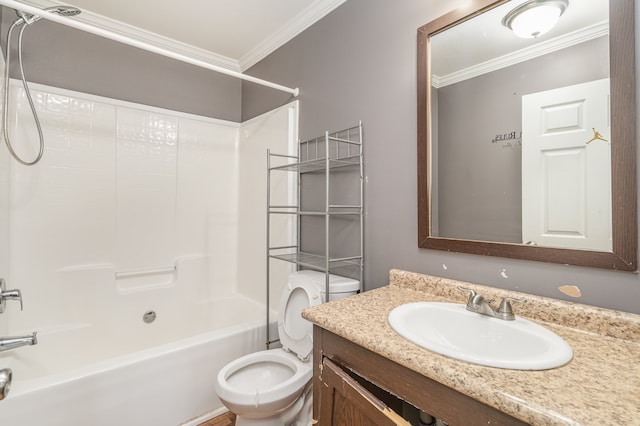 full bathroom featuring crown molding, vanity, bathtub / shower combination, and toilet