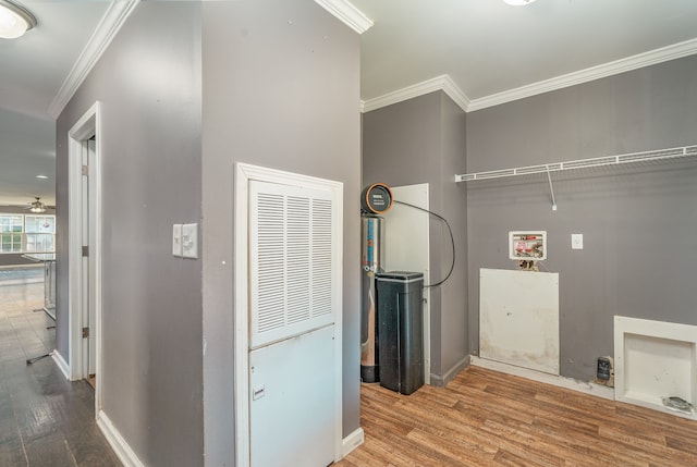 laundry room featuring crown molding, hookup for a washing machine, ceiling fan, and hardwood / wood-style floors