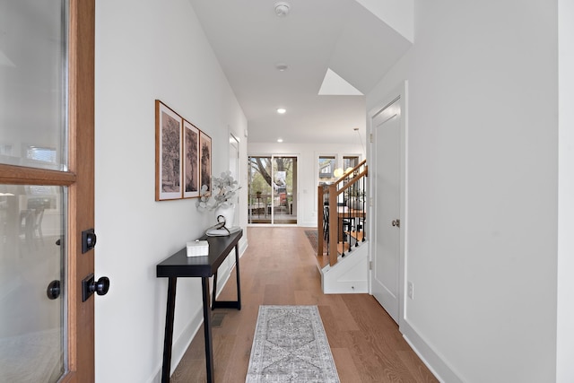 corridor featuring light hardwood / wood-style floors