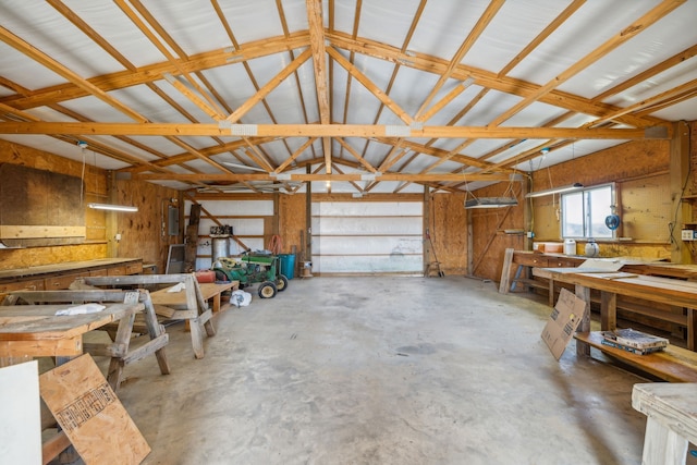 garage with a workshop area