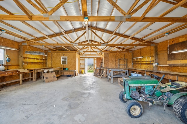 garage with a workshop area