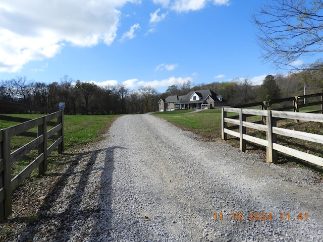 view of street featuring a rural view