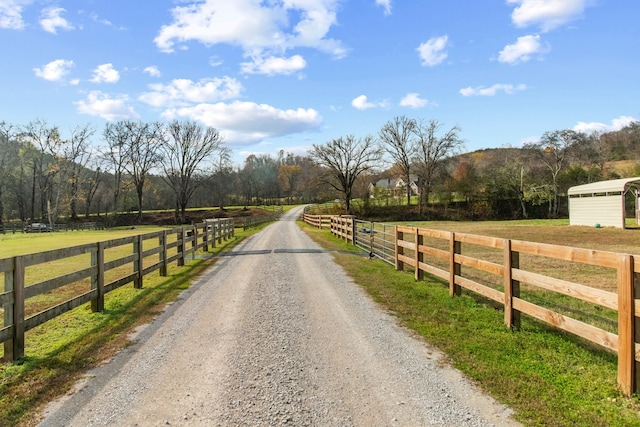 view of road with a mountain view and a rural view