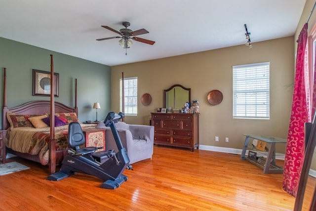 bedroom featuring ceiling fan and light wood-type flooring