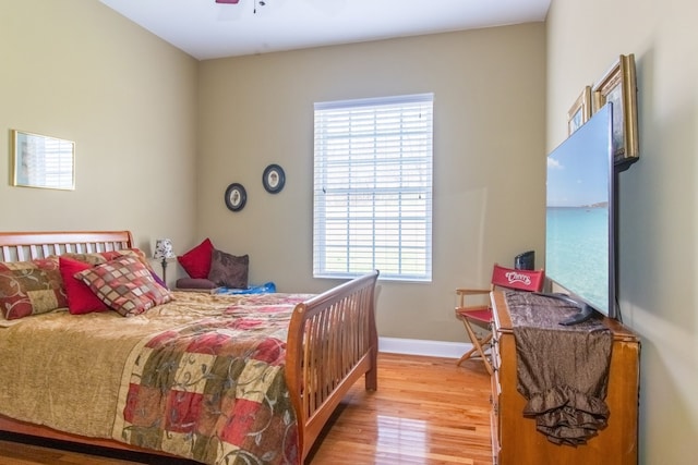 bedroom featuring ceiling fan and hardwood / wood-style floors