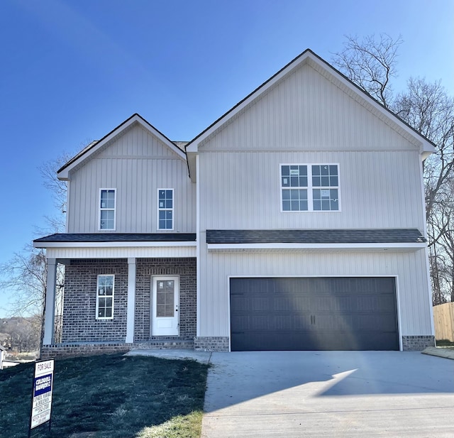 front of property with a garage