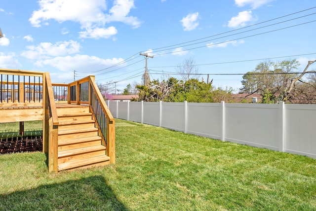 view of yard with a wooden deck