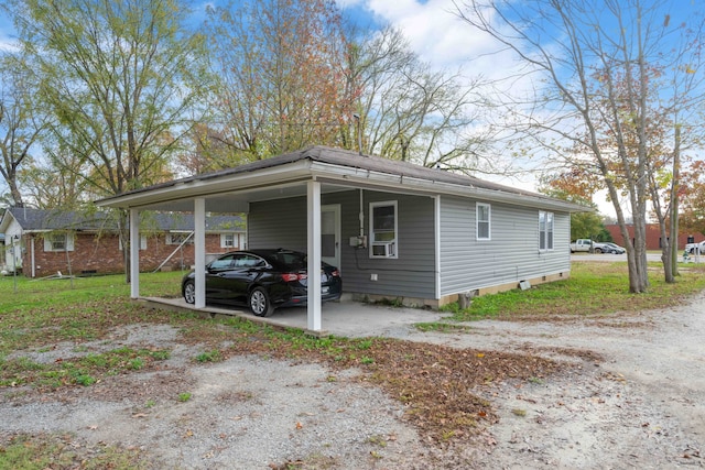 exterior space with a carport