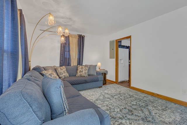 living room featuring a chandelier