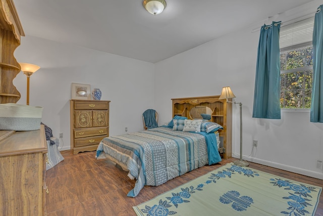 bedroom with wood-type flooring