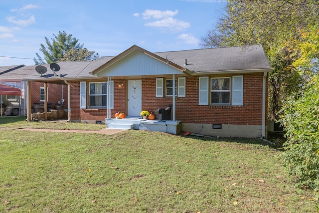 ranch-style home featuring a front lawn