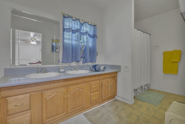 bathroom featuring vanity and ceiling fan