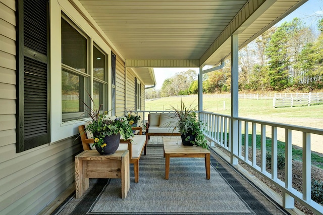 balcony featuring a porch