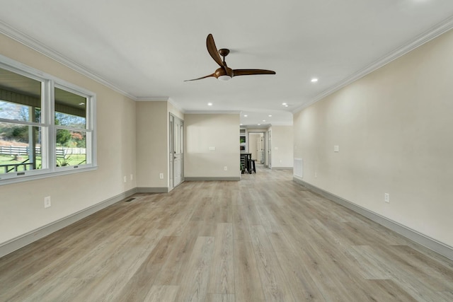 unfurnished living room featuring light hardwood / wood-style floors, ceiling fan, and crown molding