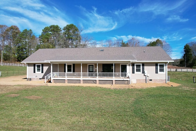 view of front of house with a front yard and a porch