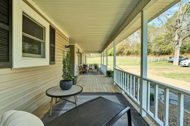 wooden deck featuring a porch