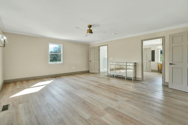 spare room with light wood-type flooring, ceiling fan, and ornamental molding