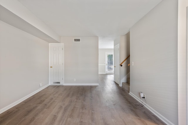 empty room with light wood-type flooring