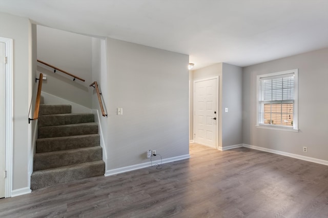 empty room with hardwood / wood-style flooring