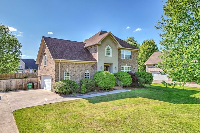 view of front of house featuring a garage and a front yard