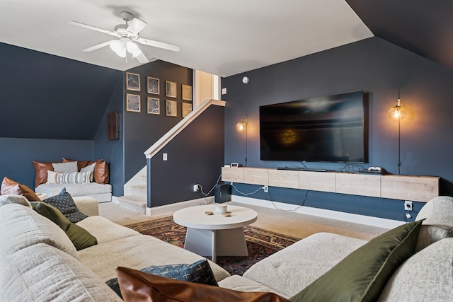 living room featuring carpet, ceiling fan, and lofted ceiling