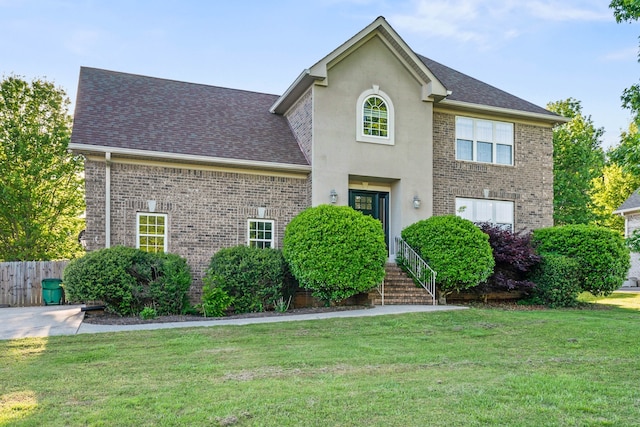 view of front facade with a front lawn