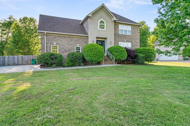 colonial inspired home with a front yard