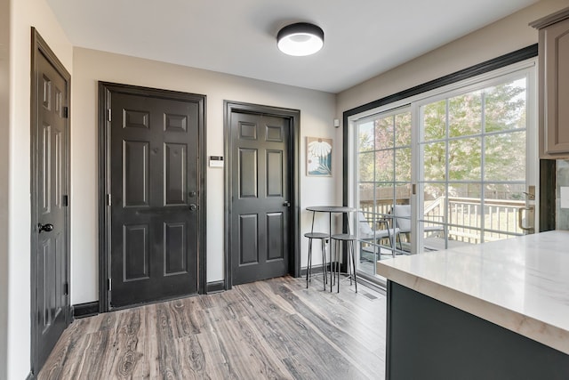 entrance foyer featuring light hardwood / wood-style floors