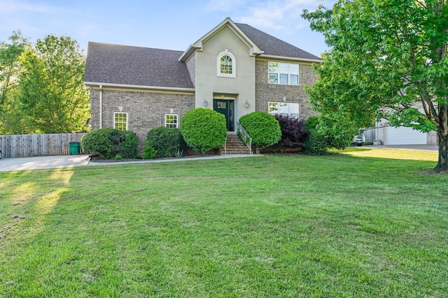 colonial home featuring a front yard