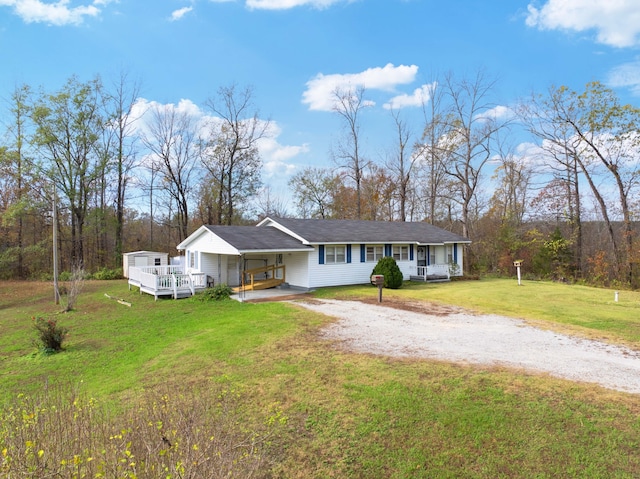 single story home with a carport and a front yard