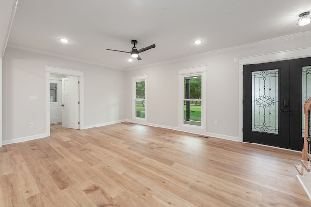 entryway featuring light hardwood / wood-style floors, ceiling fan, and crown molding