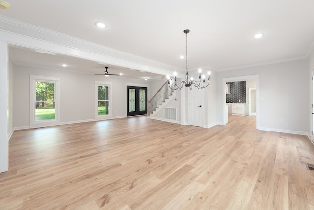 interior space featuring ceiling fan with notable chandelier, light hardwood / wood-style floors, and ornamental molding