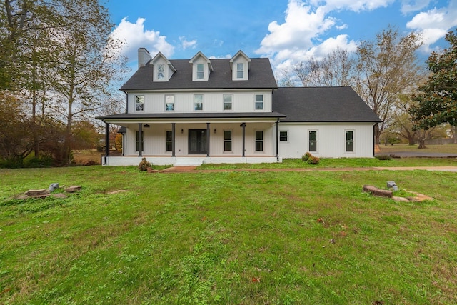 250 Bascom Rd, Jackson, TN 38305 - modern farmhouse style home featuring a chimney, a front yard, and covered porch