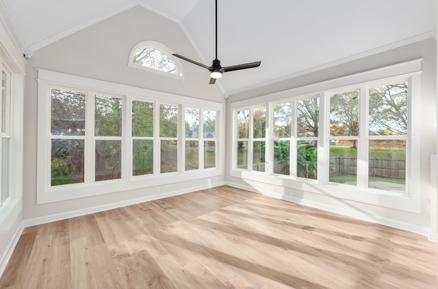 unfurnished sunroom featuring ceiling fan and lofted ceiling