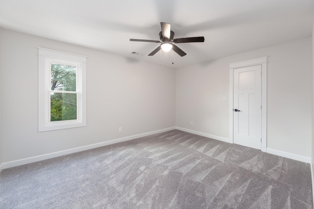250 Bascom Rd, Jackson, TN 38305 - unfurnished room featuring carpet flooring, ceiling fan, and baseboards