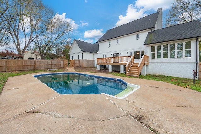 view of pool with a patio area and a deck