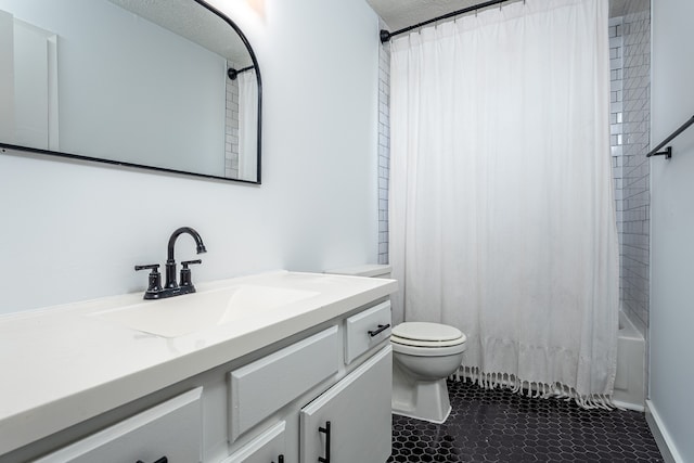 full bathroom featuring toilet, shower / bath combination with curtain, vanity, and tile patterned floors