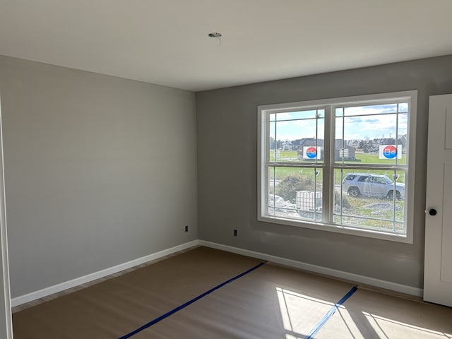 unfurnished room featuring light hardwood / wood-style floors