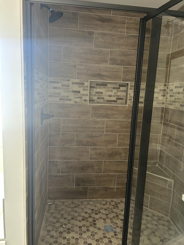 bathroom featuring walk in shower