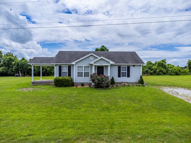 view of front facade featuring a front yard