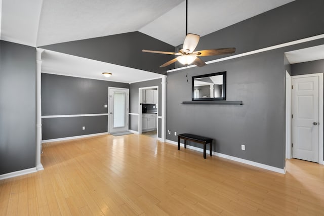 unfurnished living room featuring ceiling fan, light hardwood / wood-style flooring, and lofted ceiling