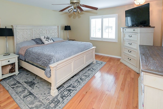 bedroom featuring ceiling fan and light wood-type flooring