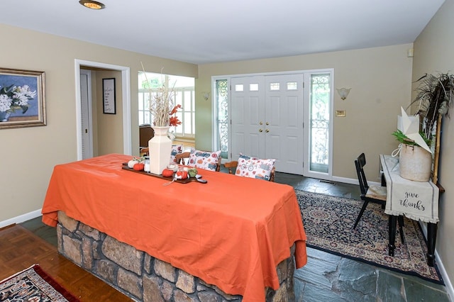 dining area featuring dark hardwood / wood-style floors